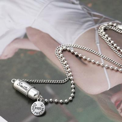 China TRENDY Landy S925 Sterling Silver Retro Niche Round Clavicle Chain English Smiley Face Pill Necklace for sale