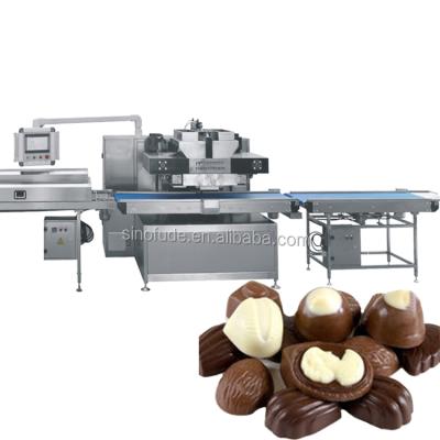 China Snack Factory Chocolate Injection Molding Machine /big center filling Chocolate Candy Making Machinery for sale