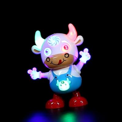 China Cute cartoon cattle dance toy early toys with lights and music education music for sale