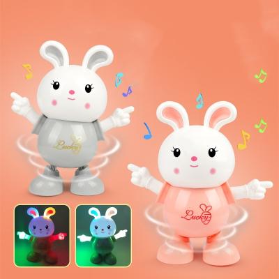 China Cute cartoon bunny dance toy early toys with lights and music education music for sale