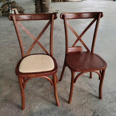 China Modern Modern Wooden Dining Cross Back Chairs For Restaurant And Wedding Events for sale