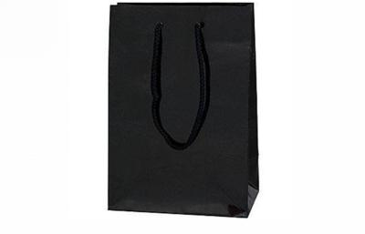 China Durable Retail Paper Shopping Bags for Packaging Printed Paper Merchandise Bags for sale