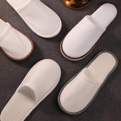 China High Qualitythickened Exquisite Disposable Hotel Amenities And Non-slip Personalized White Disposable Hotel Spa Slipper for sale