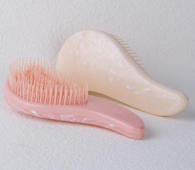 China EXFOLIATE INS Wind Massage Comb Marbled Soft Teeth Smooth Hair No Knot Hair Styling Plastic Brush for sale