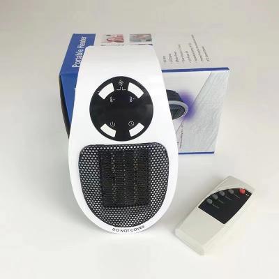 China New 500w Mini Fan Heater Winter Warm Mini Space Heater Electric Portable Wall Plug PTC Infrared Space Heater Mini Electric Heater for sale