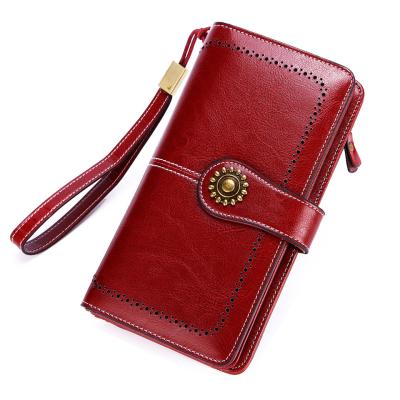 China Hot Selling Vintage Women's Wallet RFID Long Rfid Card Holder Genuine Leather Wallet For Women for sale