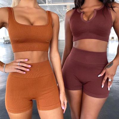 China 2022 Breathable Hot Sale Yoga Sets Fitness Women Seamless Yoga Set Shorts Sleeves Sports Bra And Yoga Shorts 2 Piece Suit for sale