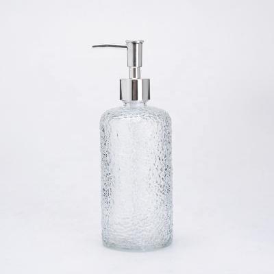 China Personal Care Clear Round Glass Pump Bottle 510ml for sale