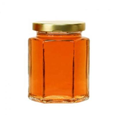 China 50ml 100ml 150ml 300ml 500ml 750ml viable hexagonal honey jar glass with tin lid for sale