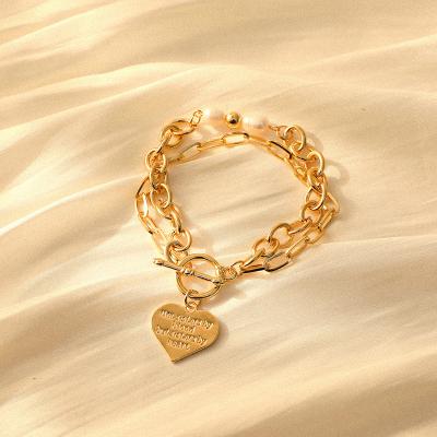 China FASHIONABLE New Product Charms Jewelry Bracelets Gold Plated Bracelet Heart Pendant Chain Bracelet for sale