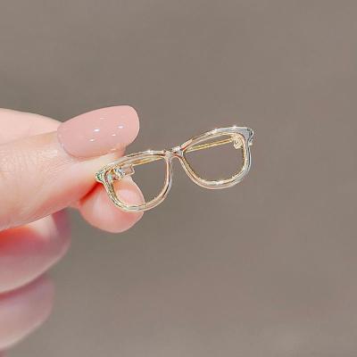 China New Durable Mini Sunglasses Gold Glasses Shape Brooch Cute Girls Cutout Glass Brooch for sale