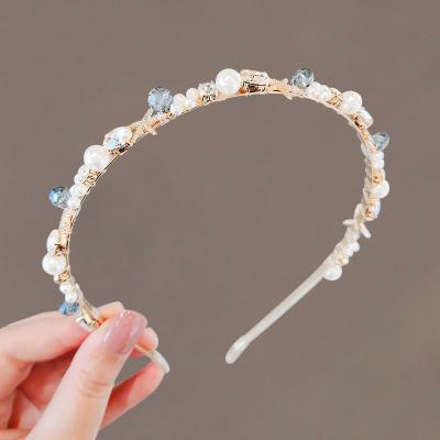 China Crystal Hot Selling Designer Headbands Summer Shell Hairbands Metal Headband Pearl Headband for sale