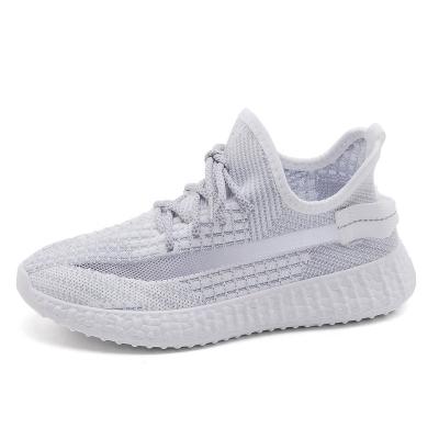 China Fashion trend ladies sneakers knitted breathable fashion non-slip soft unique running shoes for sale