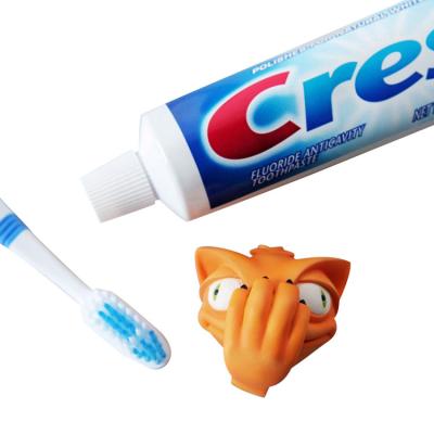 China Creative Funny Carton Dog Head Toothpaste Spread Head Toothpaste Cover for sale