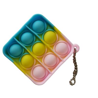 China Stress Version New Product Stir Toy Key Chain Mini Push Pop Bubble Silicone Jumping Keychain for sale