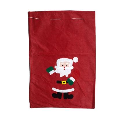 China 2022 Durable Wholesale Factory Price Christmas Nonwoven Fabric Gift Bags Drawstring Bags With Custom Logo for sale