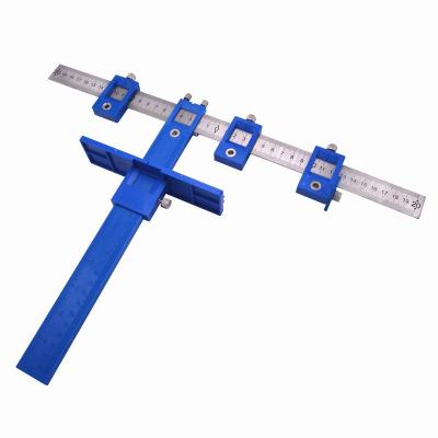 China New Household Woodworking Adjustable Thumb Drilling Metal Punch Positioner Metric Wooden Punch Dual Use Positioner for sale