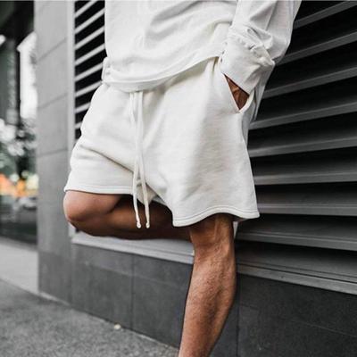 China Anti-wrinkle Mens Fashion Big Pocket Loose Shorts Plus Size Solid Color Shorts for sale