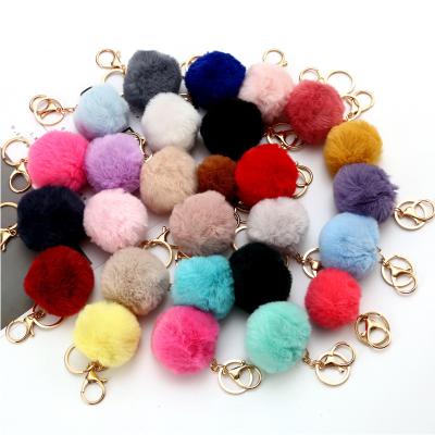 China Hot selling metal key chain design 6cm 8cm puff ball multicolor hairy fluffy pom pom accessories cute llaveros for sale