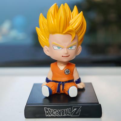 China The Other 2022 Promotional DragonBalls Son Of Goku Bobblehead Mobile Phone Holders Shaking Head Toy Cartoon Car Phone Holder Car Decoration for sale