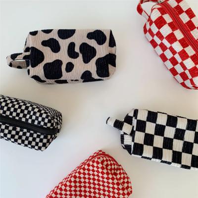 China Fashion Korea Leisure Pleated Makeup Bags Vintage Plaid Cow Print Women Cosmetic Bags for sale