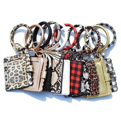 China Fashion Cute Multi Colors Tassels Bracelet Ring Leather Card Holders For Lady Keychain Card Holder for sale