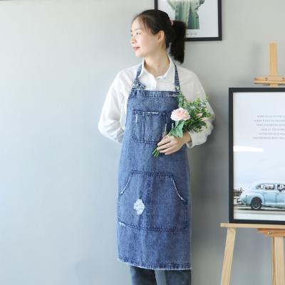 China 2021 new fashion cleaning ripped durable washed denim apron with pockets for work for sale