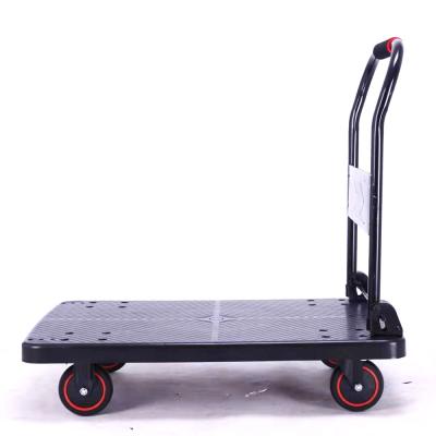 China Garden hand fodking flat cart structure platform hand push cart four wheel heavy duty storage wheel for sale