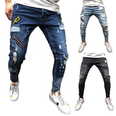 China Hot sale QUICK DRY men's streetstyle plaid frayed printed jeans stretch fashion ripped jeans damaged ripped patch skinny men's jeans for sale