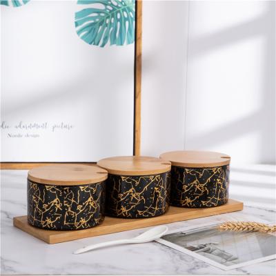 China Viable Nordic Style Kitchen Ceramic Seasoning Jar Container Spices Set With Wooden Lid And Tray for sale