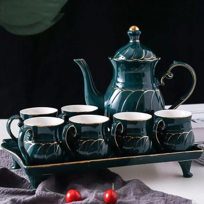 China Sustainable Hot Selling Luxurious Wedding Gift Teaware Green Gold Tea Cup Set Porcelain Tea Set With Tray for sale