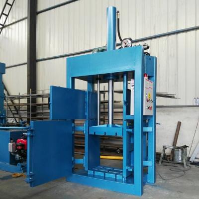 China CLOTHING CE Certificated Semi Automatic Vertical Hydraulic Cotton Fiber Baler Machine for sale