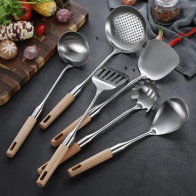 China 2023 Sustainable Hot Selling 304 Stainless Steel Kitchenware Wooden Cooking Set Products Handle Tool Kit Kitchen Utensils Accessories for sale