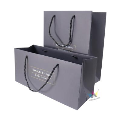 China Heat Seal Custom Shape Shopping Bag Eco - Friendly Black Personalized Paper Bag for sale