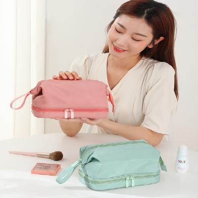 China 2021New Makeup Bag Large Capacity Storage Pocket Net Hand Wash Waterproof Simple Portable Female Red Double Bag Large for sale