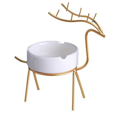 China Exquisite iron style ornament table top INS gold light cartoon elk Nordic luxury shape ashtray for sale