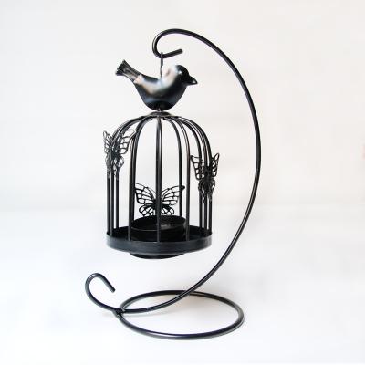 China Solar Birdcage Metal Candle Lantern with Stand Garden Storm Metal Lamp Sconce for sale