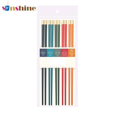 China Sinshine five-color alloy meal chopsticks viable household creative Japanese supermarket non-slip healthy solid wood tablewa for sale