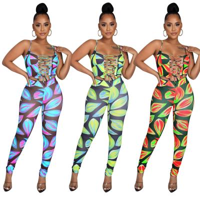 China Anti-pilling New Arrival Colorful Printed Lady Outfit Hollow Out Bandage Condole Belt Crop Top Women Sets 2 Piece Pants Set for sale