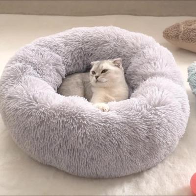 China Sustainable Soft Warm Round Plush Plush Durable Pet Bed Customized Cute Color Pet Beds for sale