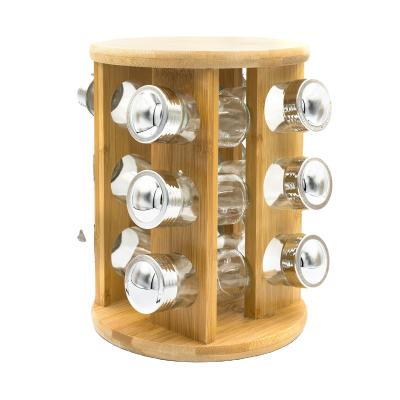 China Viable Wholesale Kitchen Seasoning Bottle Bamboo Rotating Spice Rack with 12 Spice Glass Jars for sale