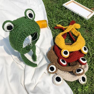 China New Design COMMON Warm Winter Hat Cute Animal Frog Eyes Handmade Woolen Knitted Hat for sale