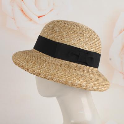 China Retro Stylish French Beach Striped Straw Hat Hepburn Straw Bow-Tie Basin Cap Summer Sun Hat for sale