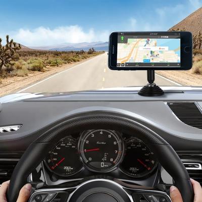 China Adjustable 360 Rotating Universal smartphone flexible paste metal mini magnetic car mount magnet mobile phone holder for sale