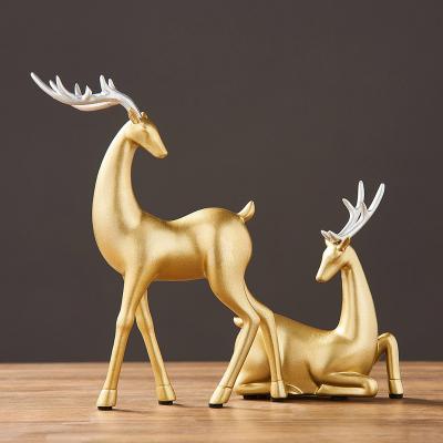 China Nordic Art Decoration Luxurious Modern Tabletop Deer Figurines Gold Home Decor Statues Art Resin Sculpture Deer Decoration Statue for sale