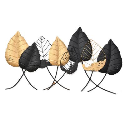 China Luxury Minimalist 3d Metal Wall Art Gold And Black Leaves Metal Wall Decor Metal Wall Sculpts Hanging Perfect For Living Room Bedroom for sale