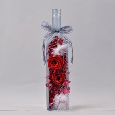 China 2022 environmental protection green hot sale good price forever rose real fresh preserved roses flowers eternal rose in glass wine bottle for sale