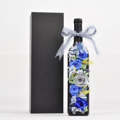 China Environmental protection Valentine's Day gift decoration green home wholesale preserved roses in the glass wine bottle for sale