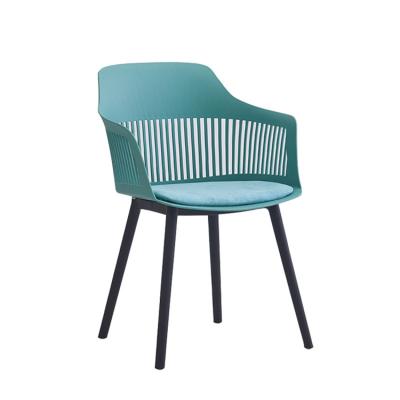 China Modern Most Popular Plastic Chairs With Fabric Cushion Dining Restaurant Furniture Metal Legs PP Plastic Dining Chairs for sale