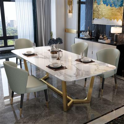 China Customized Modern Style Stainless Steel And Modern Rock Dining Table With 6 Chairs for sale